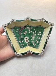 A Chinese verte biscuit 12-piece 'plum blossoms' sweetmeat set in a case, Kangxi