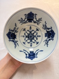 A pair of Chinese famille rose ruby-sgraffito-ground 'antiquities' bowls, Daoguang mark, 19/20th C.