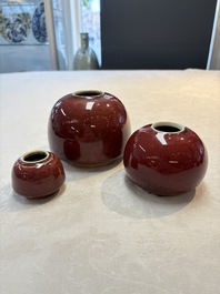Three Chinese copper-red-glazed water pots, Kangxi mark, 19th C.