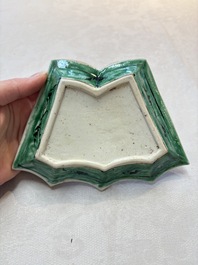 A Chinese verte biscuit 12-piece 'plum blossoms' sweetmeat set in a case, Kangxi