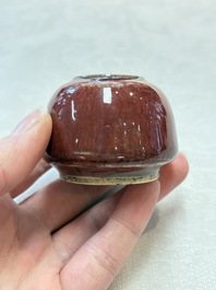 Three Chinese copper-red-glazed water pots, Kangxi mark, 19th C.