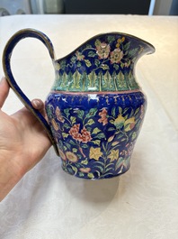 A Chinese Canton enamel blue-ground jug and a rare pink-ground ewer, Qianlong/Jiaqing