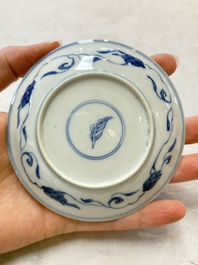 A set of four Chinese blue and white 'Sense of Smell' cups and saucers, artemisia leaf mark, Kangxi