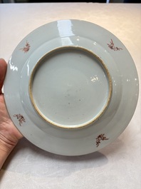 Three Chinese famille rose plates with birds among flowers and a grisaille plate, Yongzheng/Qianlong