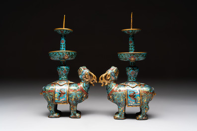 A pair of Chinese cloisonn&eacute; candlesticks and three vases, 19/20th C.