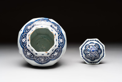 A blue, white and manganese Dutch Delft chinoiserie vase and cover, ca. 1700