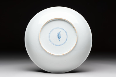 A Chinese famille verte 'peonies and butterflies' plate, Kangxi