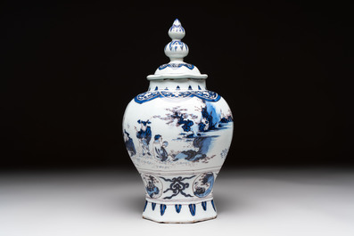 A blue, white and manganese Dutch Delft chinoiserie vase and cover, ca. 1700