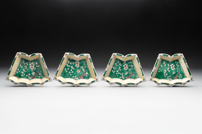 A Chinese verte biscuit 12-piece 'plum blossoms' sweetmeat set in a case, Kangxi