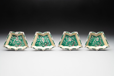 A Chinese verte biscuit 12-piece 'plum blossoms' sweetmeat set in a case, Kangxi