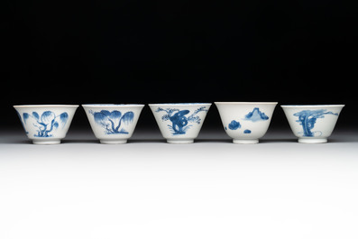 Five Chinese blue and white 'elegant beauty and boy' cups and saucers, Chenghua mark, Kangxi