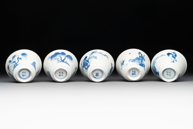 Five Chinese blue and white 'elegant beauty and boy' cups and saucers, Chenghua mark, Kangxi