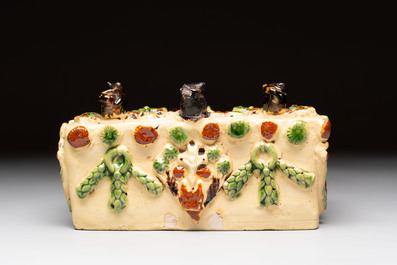 A polychrome-glazed inkwell with relief design, possibly Italy or France, 18/19th C.