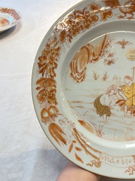 A pair of Chinese gilt-decorated iron-red 'Baptism' dishes, Yongzheng