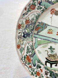 A Chinese famille verte 'lady and her cat' dish, Ding mark, Kangxi