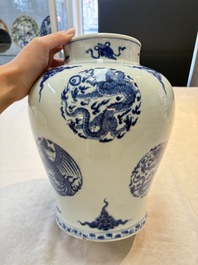 A pair of Chinese blue and white 'dragons and phoenixes' vases, Kangxi