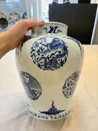 A pair of Chinese blue and white 'dragons and phoenixes' vases, Kangxi