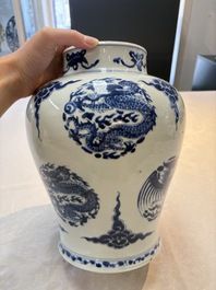 A pair of Chinese blue and white 'dragons and phoenixes' vases, Kangxi
