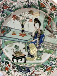 A Chinese famille verte 'lady and her cat' dish, Ding mark, Kangxi