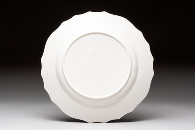 13 blue and white Tournai porcelain plates with floral design, 18/19th C.