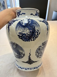 A pair of Chinese blue and white 'dragons and phoenixes' vases, Kangxi