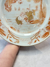 A pair of Chinese gilt-decorated iron-red 'Baptism' dishes, Yongzheng