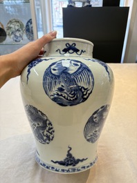 A pair of Chinese blue and white 'dragons and phoenixes' vases, Kangxi