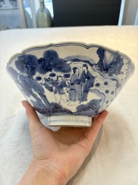 A rare Chinese blue and white 'Seven Sages of the Bamboo Grove' conical bowl, Kangxi mark and of the period