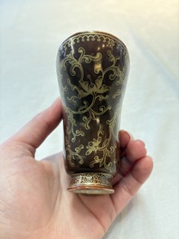 A Chinese gilt-decorated brown-glazed libation cup with a chilong-form handle, Qianlong mark and of the period