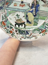 A Chinese famille verte 'lady and her cat' dish, Ding mark, Kangxi