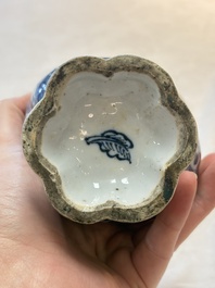 A Chinese blue and white double-spouted swirling-lobed cruet, Kangxi