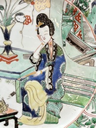 A Chinese famille verte 'lady and her cat' dish, Ding mark, Kangxi