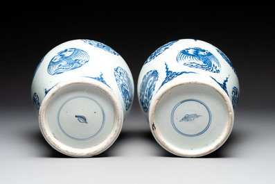 A pair of Chinese blue and white 'dragons and phoenixes' vases, Kangxi