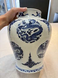 A pair of Chinese blue and white 'dragons and phoenixes' vases, Kangxi
