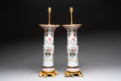 A pair of Chinese famille rose vases with fine gilt-bronze lamp mounts, Yongzheng
