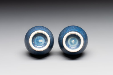 A pair of Chinese blue-glazed 'Hatcher Cargo' bottle vases with incised dragons, Transitional period