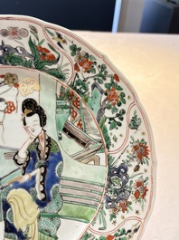 A Chinese famille verte 'lady and her cat' dish, Ding mark, Kangxi