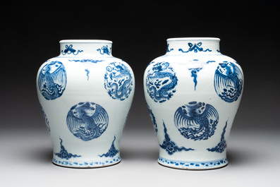 A pair of Chinese blue and white 'dragons and phoenixes' vases, Kangxi