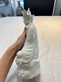 A Chinese white-glazed figure of Xuanzang, Cai Chang Tai 蔡昌泰造 mark, 20th C.