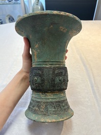 A Chinese archaic bronze wine vessel with taotie design, 'zun 尊', Western Zhou
