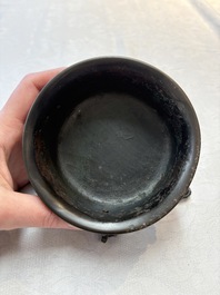 A Chinese bronze tripod censer and cover, Sui/Tang