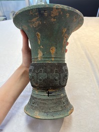 A Chinese archaic bronze wine vessel with taotie design, 'zun 尊', Western Zhou