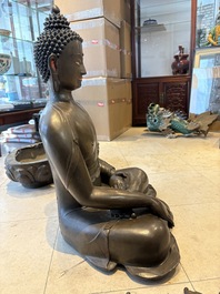 An exceptionally large Nepalese bronze figure of Buddha, 19th C.