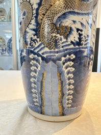 A large Chinese gilt-decorated blue and white 'dragon' rouleau vase, 19th C.