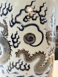 A large Chinese gilt-decorated blue and white 'dragon' rouleau vase, 19th C.