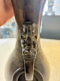A large Chinese bronze 'hu' vase with luduan-form handles, Yuan