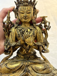 An extremely rare and fine Chinese gilt-bronze Buddha, inscribed 大明正統己未金川比丘昌靜捐資命工造, Zhengtong mark and of the period, dated 1439