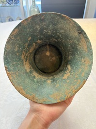 A Chinese archaic bronze wine vessel with taotie design, 'zun 尊', Western Zhou