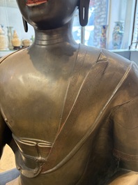An exceptionally large Nepalese bronze figure of Buddha, 19th C.