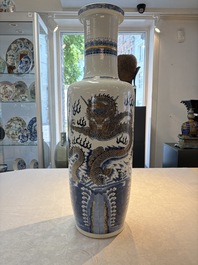A large Chinese gilt-decorated blue and white 'dragon' rouleau vase, 19th C.